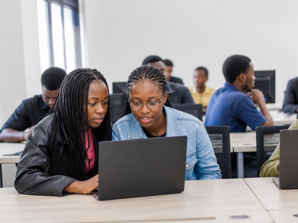 Young Rwandan tech students learning in a computer lab
